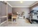 Office with neutral colored walls, treadmill, and natural light at 2126 Roberts View Trl, Buford, GA 30519