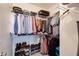 Organized walk-in closet with ample hanging space and shelving for shoes and accessories at 1175 Glenridge Pl, Atlanta, GA 30342