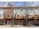 Attractive townhome featuring a private balcony and individual garage at 1175 Glenridge Pl, Atlanta, GA 30342