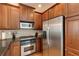 Efficient kitchen with stainless steel appliances, ample cabinetry, and a seamless blend of style and functionality at 1175 Glenridge Pl, Atlanta, GA 30342