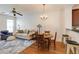 Stylish living and dining area with hardwood floors, open layout, and a neutral color palette at 1175 Glenridge Pl, Atlanta, GA 30342