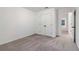Carpeted bedroom with window offers a bright and neutral space at 5384 Heron Bay Blvd, Locust Grove, GA 30248