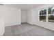 This loft has a cozy carpet and a window overlooking the outdoors at 5384 Heron Bay Blvd, Locust Grove, GA 30248