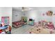 bedroom featuring bright and playful decor with two twin beds at 6219 Wurtenburg Ct, Stone Mountain, GA 30087