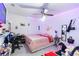 Cozy bedroom featuring modern decor, soft lighting, and creating a comfortable retreat for relaxation at 6219 Wurtenburg Ct, Stone Mountain, GA 30087