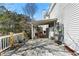 Expansive deck with white railing provides ample space for outdoor living and entertaining at 6219 Wurtenburg Ct, Stone Mountain, GA 30087