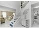 Elegant foyer featuring a staircase with decorative wrought iron railing at 6219 Wurtenburg Ct, Stone Mountain, GA 30087