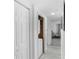 Hallway with washer and dryer hookups leading into a dining area at 6219 Wurtenburg Ct, Stone Mountain, GA 30087