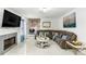 Comfortable living area features stylish furniture, a fireplace, and marble floors at 6219 Wurtenburg Ct, Stone Mountain, GA 30087