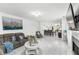 Spacious open-concept living space featuring stylish decor and marble floors at 6219 Wurtenburg Ct, Stone Mountain, GA 30087