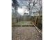 Fenced backyard with potential for landscaping and outdoor activities at 498 Prince Of Wales, Stone Mountain, GA 30083