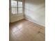 Bedroom with natural light, a neutral color scheme, and clean tile flooring at 498 Prince Of Wales, Stone Mountain, GA 30083