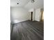 Bedroom featuring modern floors, a closet, and neutral paint at 498 Prince Of Wales, Stone Mountain, GA 30083