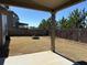 View of the backyard with a patio, wooden fence, and a fire pit, perfect for outdoor entertaining at 3988 Two Bridge Drive, Buford, GA 30519