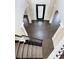Elegant foyer with hardwood floors, decorative columns, and a beautiful front door with stained glass accents at 3988 Two Bridge Drive, Buford, GA 30519