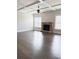 Bright and open living room with coffered ceilings, stone fireplace, and hardwood floors at 3988 Two Bridge Drive, Buford, GA 30519