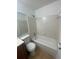 The bathroom features a white shower/tub combo with tile surround and a matching toilet at 465 Prince Of Wales, Stone Mountain, GA 30083