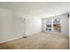 Minimalist bedroom with carpet, bright windows, and natural light at 1321 Keys Lake Ne Dr, Brookhaven, GA 30319