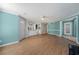 Open concept featuring living room, kitchen with white countertops, and access to exterior at 1321 Keys Lake Ne Dr, Brookhaven, GA 30319