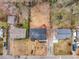 Aerial view of neighborhood property with grassy yards and mature trees at 2195 Burroughs Ave, Atlanta, GA 30315