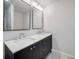 Stylish bathroom featuring a double vanity with modern fixtures and ample storage at 2195 Burroughs Ave, Atlanta, GA 30315