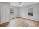 Bright bedroom with hardwood floors, large windows, and a neutral color palette at 2195 Burroughs Ave, Atlanta, GA 30315