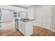 Bright kitchen island with stainless steel appliances and an open floor plan at 2195 Burroughs Ave, Atlanta, GA 30315