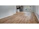 Open-concept living area featuring hardwood floors and neutral tones at 2195 Burroughs Ave, Atlanta, GA 30315