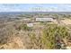 Aerial view of Villa Rica property including highway 78 and Little Tallapoosa River at 285 Blackstock Rd, Villa Rica, GA 30180