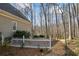 Backyard with privacy fence bordering wooded area at 285 Blackstock Rd, Villa Rica, GA 30180