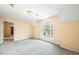 Bright room with an arched window overlooking the outdoors at 285 Blackstock Rd, Villa Rica, GA 30180