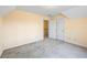 Bedroom featuring two doors, a window, and lots of light at 285 Blackstock Rd, Villa Rica, GA 30180