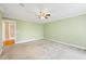 Spacious bedroom featuring a ceiling fan and neutral walls ready for personalization at 285 Blackstock Rd, Villa Rica, GA 30180