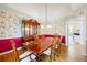 Traditional dining room with hardwood floors and a large wood table, perfect for Gathering gatherings at 285 Blackstock Rd, Villa Rica, GA 30180