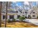 Beautiful home with neutral color scheme, dark shutters, and beautiful landscaping at 285 Blackstock Rd, Villa Rica, GA 30180