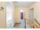 Hallway with many doorways to different rooms and skylight in the ceiling at 285 Blackstock Rd, Villa Rica, GA 30180