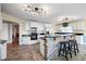 Spacious kitchen with a stone accent island, stainless steel appliances, and white cabinets at 285 Blackstock Rd, Villa Rica, GA 30180