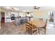 Open floor plan with kitchen island with stone accents, dining table and kitchen area at 285 Blackstock Rd, Villa Rica, GA 30180