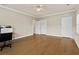 Large bonus room featuring a ceiling fan, hardwood floors, and neutral paint at 160 Antler Trl, Alpharetta, GA 30005