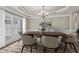 Dining room with a chandelier, windows with blinds, and space for entertaining at 160 Antler Trl, Alpharetta, GA 30005