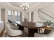 Dining room featuring an area rug, a chandelier, and space for entertaining at 160 Antler Trl, Alpharetta, GA 30005