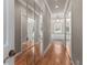 Hallway features mirrored closets leading to a bright bathroom at 160 Antler Trl, Alpharetta, GA 30005