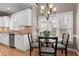 Bright eat-in kitchen with stainless steel appliances, granite countertops, and a cozy breakfast nook with a view at 160 Antler Trl, Alpharetta, GA 30005