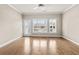 Bright living room featuring hardwood floors and access to outside at 160 Antler Trl, Alpharetta, GA 30005