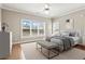 Relaxing main bedroom boasting a large window and neutral colored interior at 160 Antler Trl, Alpharetta, GA 30005