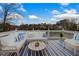 Inviting patio area with plush seating, a stylish rug, and a coffee table, perfect for outdoor relaxation at 160 Antler Trl, Alpharetta, GA 30005