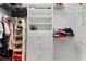 Well-organized walk-in closet featuring custom shelving, drawers, and hanging rods for optimal storage and organization at 160 Antler Trl, Alpharetta, GA 30005