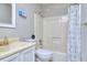 This bathroom has a bathtub, toilet, sink, mirror, and towel rack for your personal care at 586 Windchase Ln, Stone Mountain, GA 30083