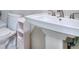 Bathroom with a pedestal sink and a commode at 586 Windchase Ln, Stone Mountain, GA 30083