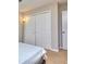 This bedroom features carpeted floors and a closet that can hold all your personal belongings at 586 Windchase Ln, Stone Mountain, GA 30083